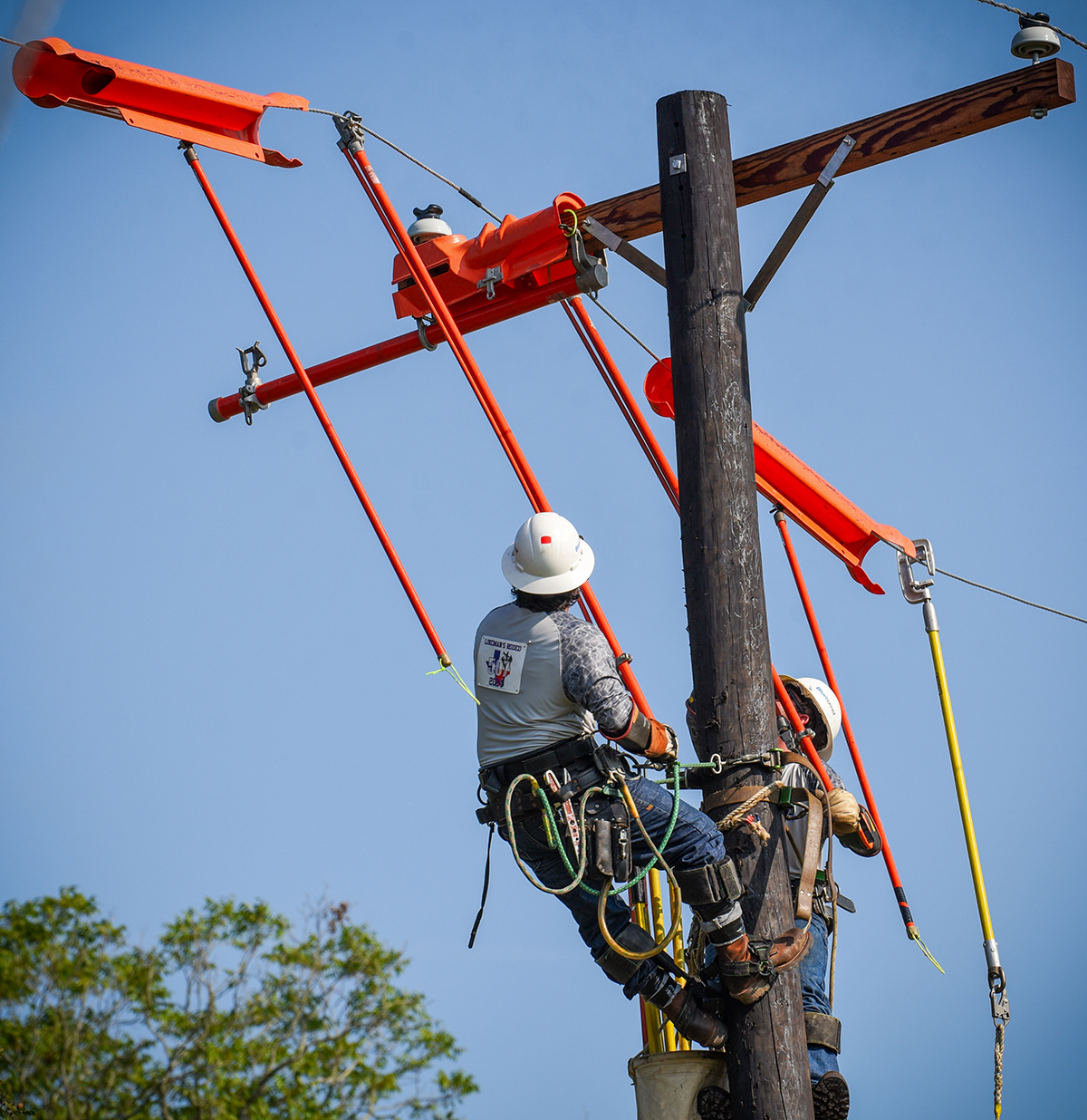 Journeyman team (Maxwell): Ty Duesterheft, Maxwell, Journeyman (top of pole, right) John Zamora, Maxwell, Journeyman (top of pole, left) Joe Lockhart, Maxwell, Journeyman (ground- not pictured)