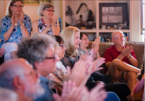 (Jay Godwin photo) Bluebonnet Board member Debbi Goertz enjoys a performance by Austin fiddler/songwriter Warren Hood at the Smithville home of Jeri and Walter Winslett.